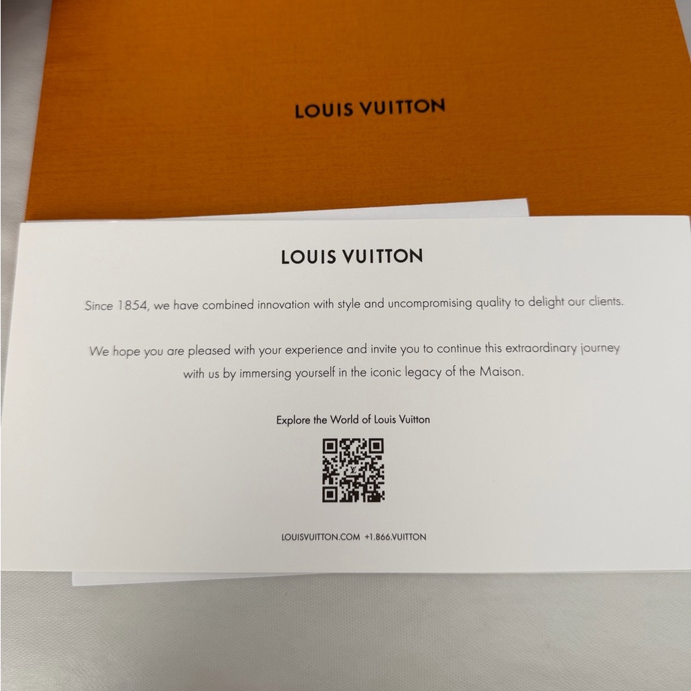 Louis Vuitton Tan and White Tag